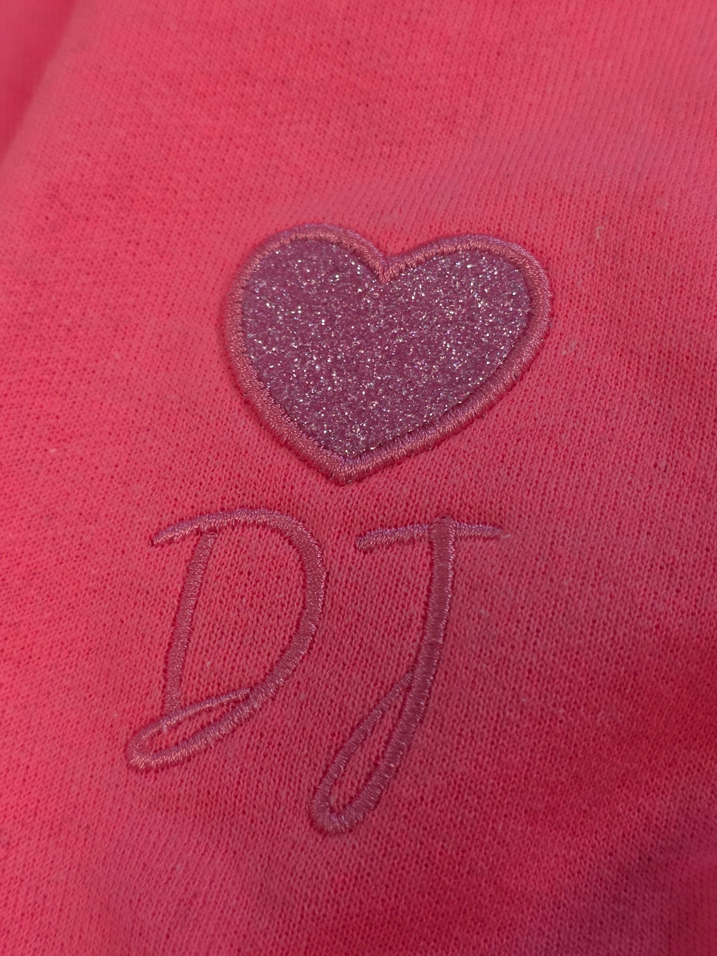 Glitter heart & childs name on sleeve